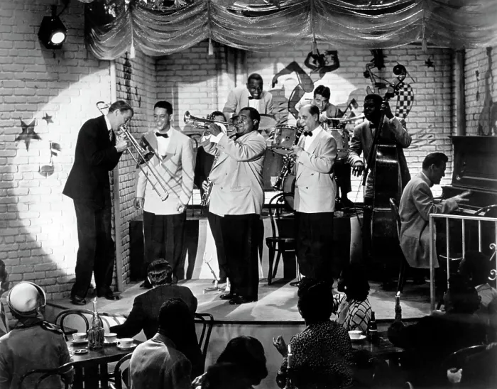 Framed Print : THE GLENN MILLER STORY, James Stewart, Louis Armstrong, Barney Bigard (clarinet player), Gene Krupa (drummer, right), 1954 Framed Print : THE GLENN MILLER STORY, James Stewart, Louis Armstrong, Barney Bigard (clarinet player), Gene Krupa (drummer, right), 1954