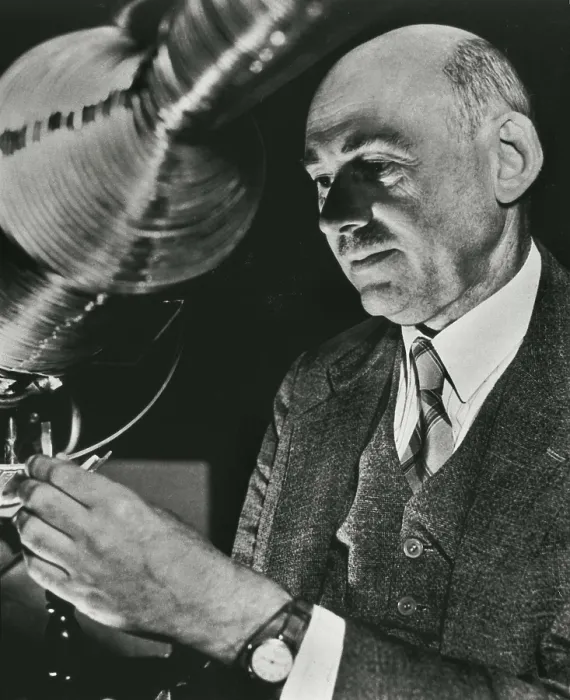 Framed Print : GODDARD, Robert Hutchings (1882-1945). Goddar making adjustments in a combustion rocket. AISA / Everett Collection**US SALES ONLY**