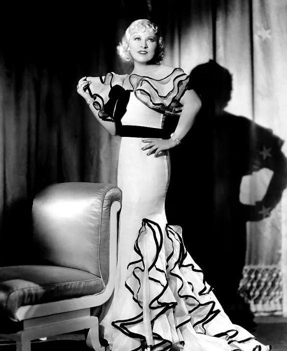 Framed Print : GOIN TO TOWN, Mae West (in a gown by Travis Banton), 1935