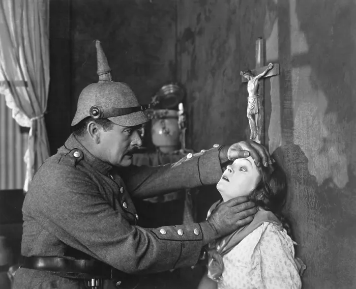 Framed Print : Still from Goldwyn's all-star Liberty Loan picture, Stake Uncle Sam to Play Your Hand. Mae Marsh, plays a Belgian girl, and A.C. Gibbons is a German soldier Framed Print : Still from Goldwyn's all-star Liberty Loan picture, Stake Uncle Sam to Play Your Hand. Mae Marsh, plays a Belgian girl, and A.C. Gibbons is a German soldier