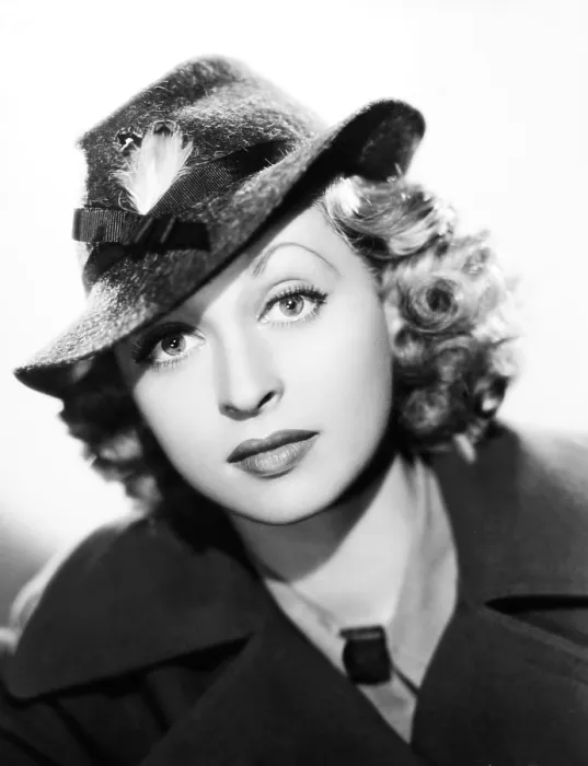 Framed Print : GOOD MORNING, BOYS, Lilli Palmer, in a smart sports hat in brown brushed felt with a stitched brim, 1937