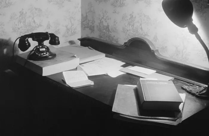 Framed Print : A US government clerk's home office desk with books, telephone and directory, and a desk lamp. Washington, D.C. 1939 Framed Print : A US government clerk's home office desk with books, telephone and directory, and a desk lamp. Washington, D.C. 1939