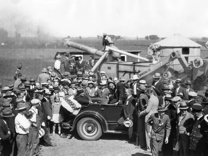 Framed Print : Governor Franklin Roosevelt campaigning for President in Nebraska. FDR listens to farmers with a threshing machine as a backdrop. Sept. 29, 1930