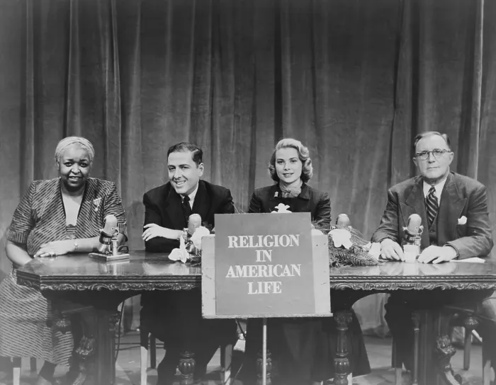 Framed Print : Grace Kelly appears with Ethel Waters, Herman Wouk, and Charles E. Wilson on a panel in a television program of the organization Religion in American Life. 1953