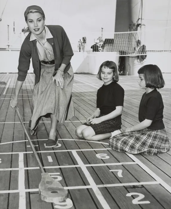 Framed Print : Grace Kelly by playing shuffleboard on the deck of the USS Constitution, April 10, 1956