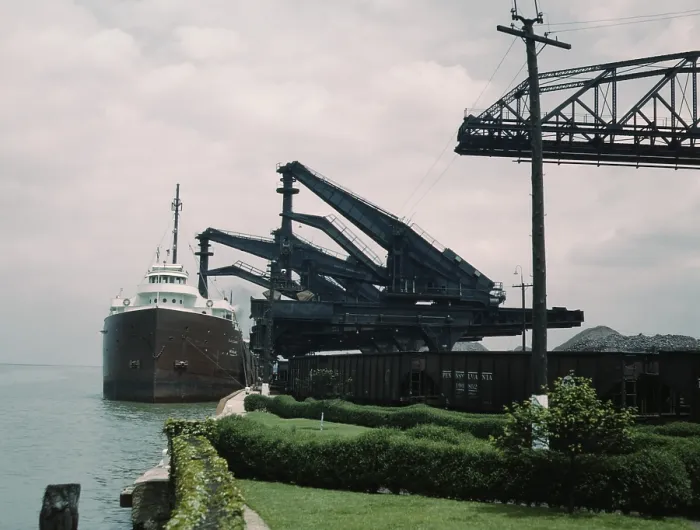 Framed Print : Great Lakes freighter unloading iron ore at the Pennsylvania Railroad ore docks in Cleveland Ohio
