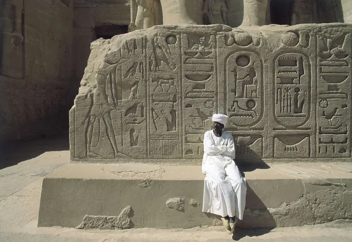 Framed Print : Great Temple of Rameses II. EGYPT. ASWAN. Abu Simbel. Great Temple of Rameses II. Pedestal of the third colossus (from left to right) at the entrance of the temple. Egyptian art