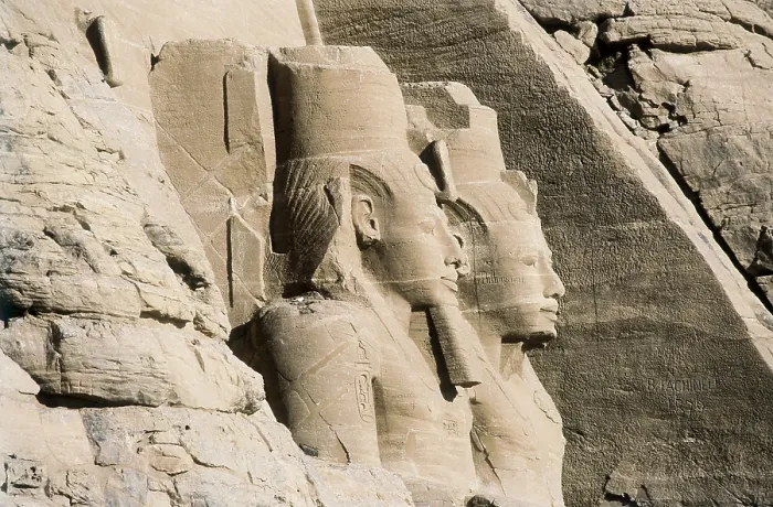Framed Print : Great Temple of Rameses II. EGYPT. ASWAN. Abu Simbel. Great Temple of Rameses II. Upper section of two of the four colossus that flank the entrance to the Great Temple