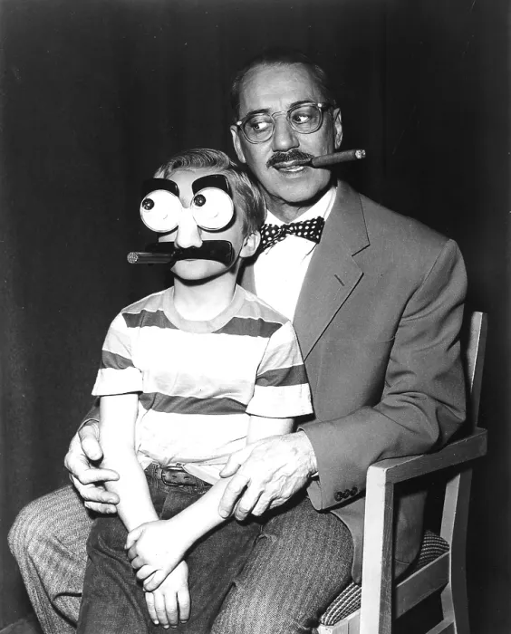 Framed Print : Groucho Marx and a child with a Groucho mask, 1955. Courtesy: CSU Archives  /  Everett Collection