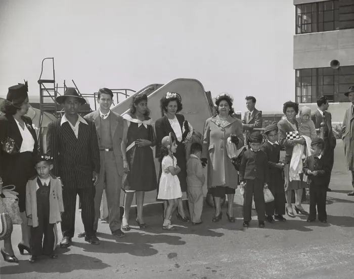 Framed Print : Group of Puerto Ricans, at Newark airport, April 29, 1947. They just arrived from Puerto Rico and are waiting to be transported to New York. April 29, 1947. (BSLOC_2014_13_133)