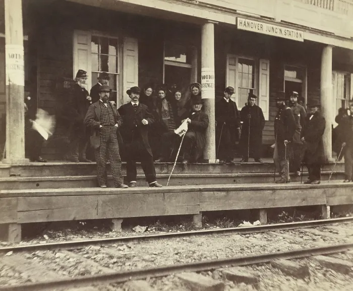 Framed Print : A group of well-dressed men and women standing on the platform of Hanover Junction railroad Station Framed Print : A group of well-dressed men and women standing on the platform of Hanover Junction railroad Station