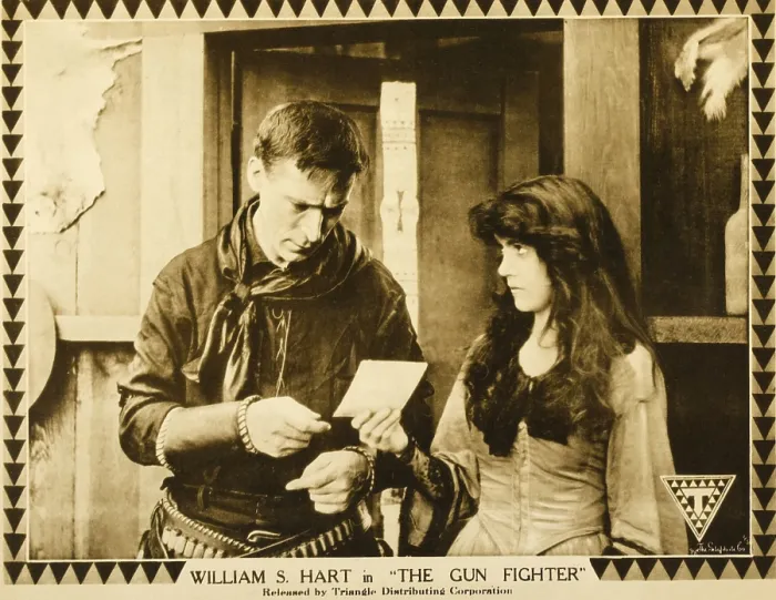 Framed Print : THE GUN FIGHTER, l-r: William S. Hart, Margery Wilson on lobbycard, 1917