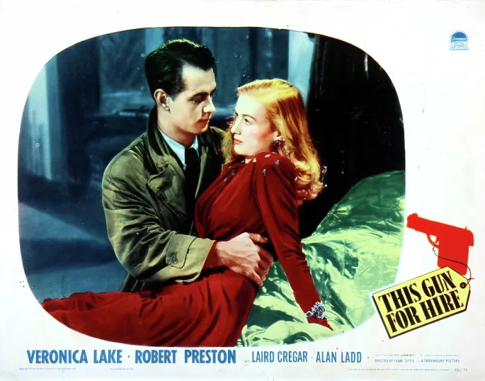 Framed Print : THIS GUN FOR HIRE, from left: Alan Ladd, Veronica Lake on lobbycard, 1942