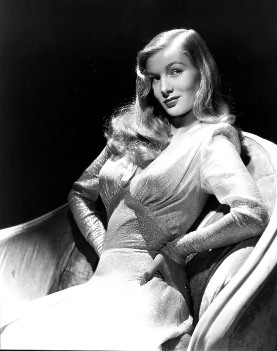 Framed Print : THIS GUN FOR HIRE, Veronica Lake, in a gown by Edith Head, 1942