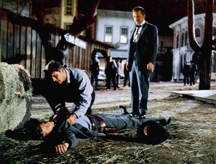 Framed Print : GUNFIGHT AT THE O.K. CORRAL, Burt Lancaster, Kirk Douglas, Martin Milner, (on ground), 1957 Framed Print : GUNFIGHT AT THE O.K. CORRAL, Burt Lancaster, Kirk Douglas, Martin Milner, (on ground), 1957
