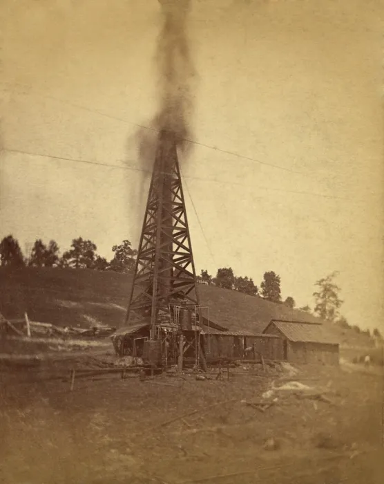 Framed Print : Gusher spewing oil from top of a derrick at the Lady Hunter Well near Petrolia City, Pennsylvania. Ca. 1880