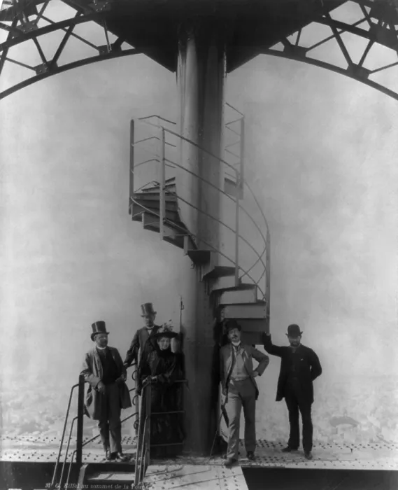 Framed Print : Gustave Eiffel and four others at the summit of the Eiffel Tower, during Paris Exposition. Ca. 1889