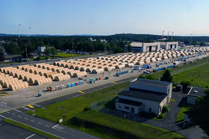 Framed Print : Half barrel-shaped tents awaiting Afghan evacuees stand on a paved area the US Ramstein Air Base, Germany, Aug. 24, 2021 Framed Print : Half barrel-shaped tents awaiting Afghan evacuees stand on a paved area the US Ramstein Air Base, Germany, Aug. 24, 2021