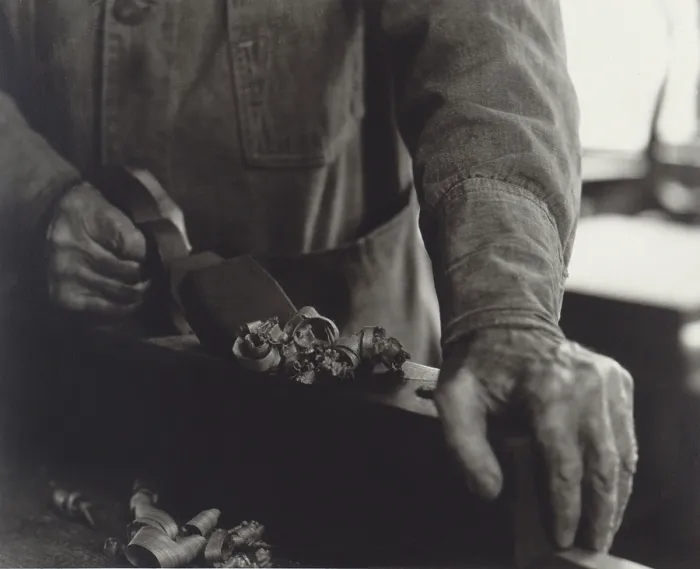 Framed Print : Hands of Shaker Brother Ricardo Belden using a wooden plane in a workshop at the Hancock Shaker village near Pittsfield, Massachusetts. 1935 photo by Samuel Kravitt