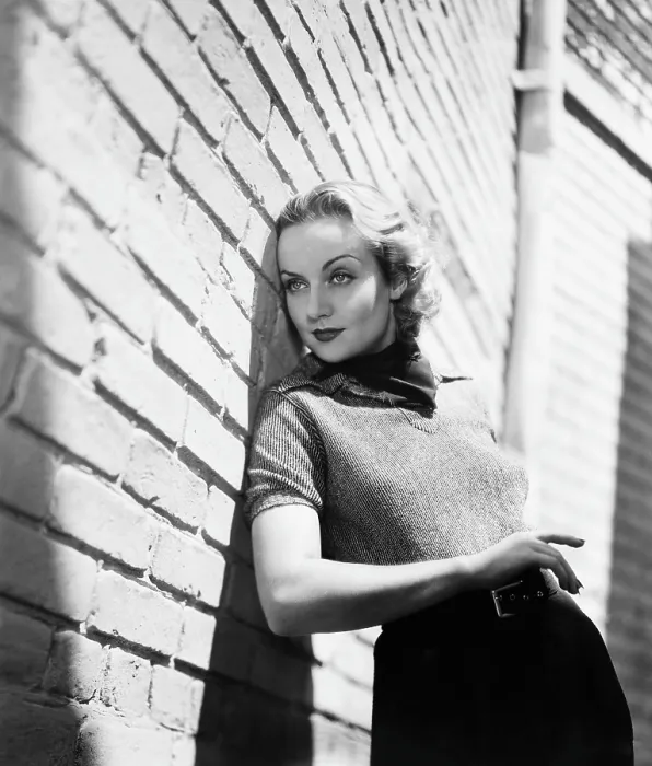 Framed Print : HANDS ACROSS THE TABLE, Carole Lombard, on the Paramount lot between takes, September 1935 Framed Print : HANDS ACROSS THE TABLE, Carole Lombard, on the Paramount lot between takes, September 1935