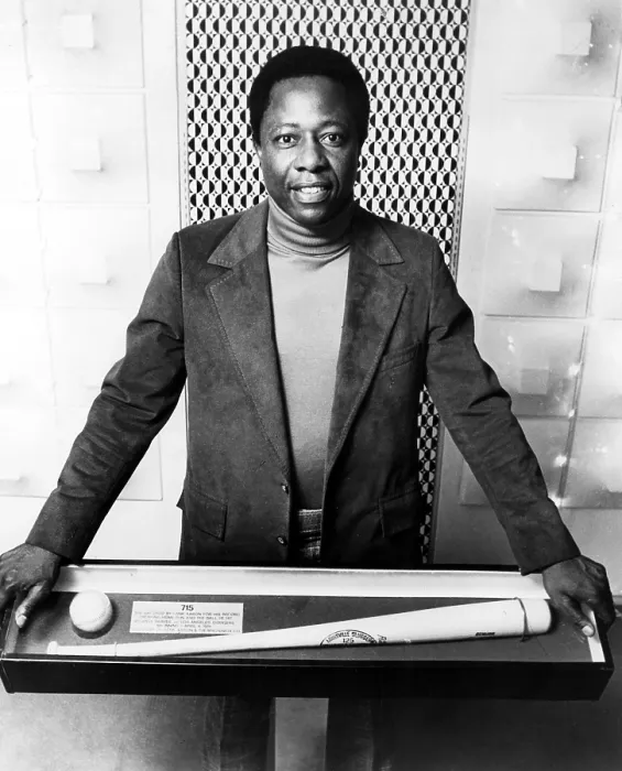 Framed Print : Hank Aaron poses with bat and ball used in hitting record breaking 715th career home run. Photo dated: 06-18-1975.. Courtesy: CSU Archives / Everett Collection Framed Print : Hank Aaron poses with bat and ball used in hitting record breaking 715th career home run. Photo dated: 06-18-1975.. Courtesy: CSU Archives / Everett Collection