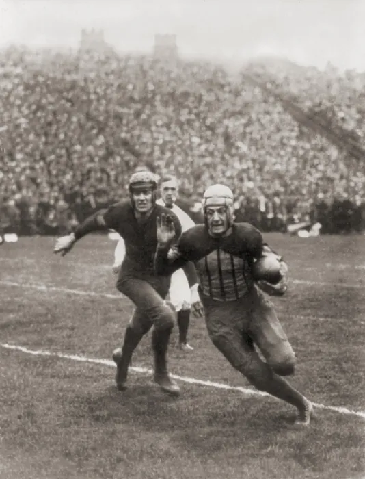 Framed Print : Harold Red Grange carrying football in Illinois-Michigan game, 1925 (BSLOC_2020_2_189) Framed Print : Harold Red Grange carrying football in Illinois-Michigan game, 1925 (BSLOC_2020_2_189)