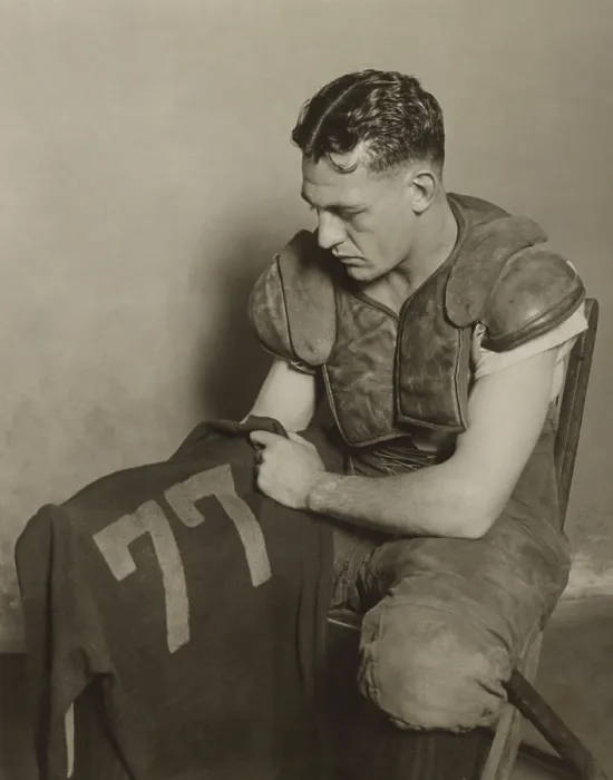Framed Print : Harold Red Grange holding his football jersey number. His number 77 was retired at the University of Illinois in 1925. - (BSLOC_2015_1_112)