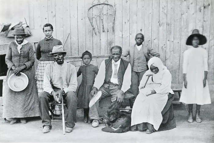 Framed Print : Harriet Tubman (far left), African American abolitionist with former slaves, in 1887