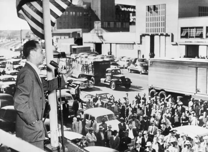 Framed Print : Harry Bridges, behind microphone during CIO convention in Cleveland, Nov. 1949. Bridges refused to leave the union that was attempting to throw out its left-wing members