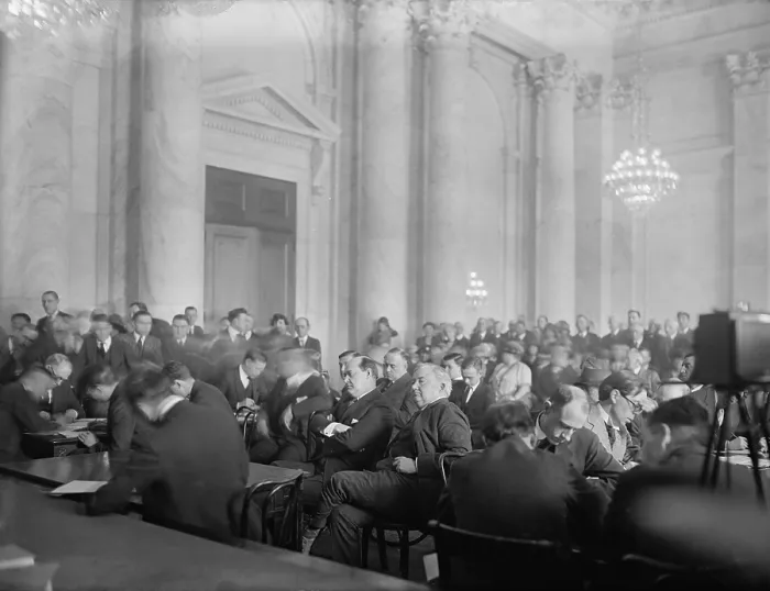 Framed Print : Harry F. Sinclair (1876-1956) (center with arms folded) appearing before the Senate Committee on Public Lands and Surveys investigation of the Teapot Dome scandal Framed Print : Harry F. Sinclair (1876-1956) (center with arms folded) appearing before the Senate Committee on Public Lands and Surveys investigation of the Teapot Dome scandal