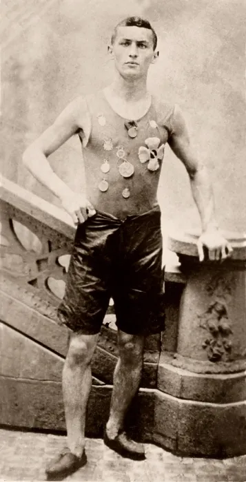 Framed Print : Harry Houdini (1874-1926), in 1890, when his name was still Ehrich Weiss. He is wearing medals, he won as a member of the Pastime Athletic Club track team in New York Framed Print : Harry Houdini (1874-1926), in 1890, when his name was still Ehrich Weiss. He is wearing medals, he won as a member of the Pastime Athletic Club track team in New York
