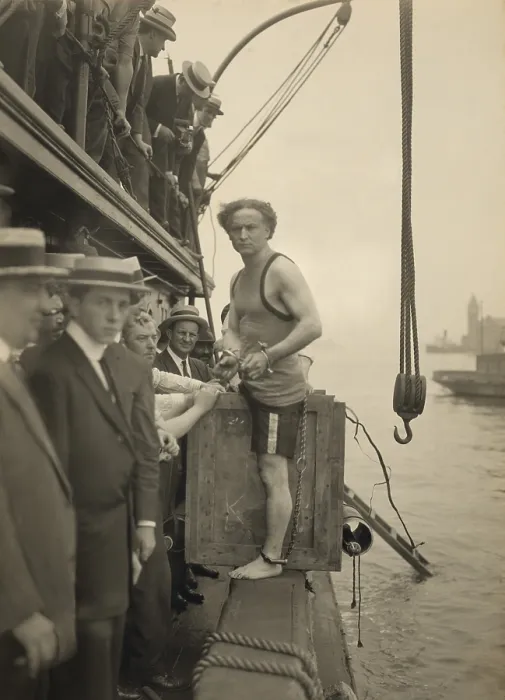 Framed Print : Harry Houdini stepping into a crate to be lowered into New York Harbor on July 7, 1912