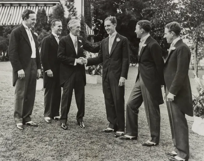 Framed Print : Harvey Firestone congratulating his youngest son Roger at his wedding, Aug. 22, 1930. Rogers four older brothers look on. (BSLOC_2013_8_223)