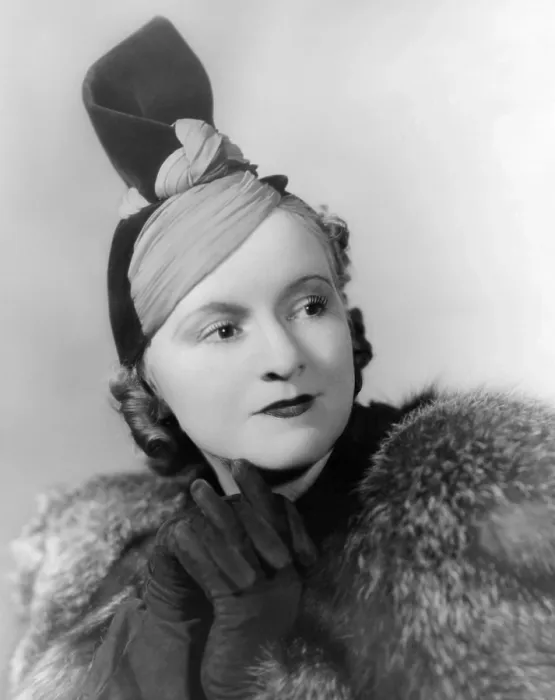 Framed Print : Hat by American designer and milliner Marian Valle. The two contrasting fabrics are twisted in a close to the head base that supports a high raised twist. 1937
