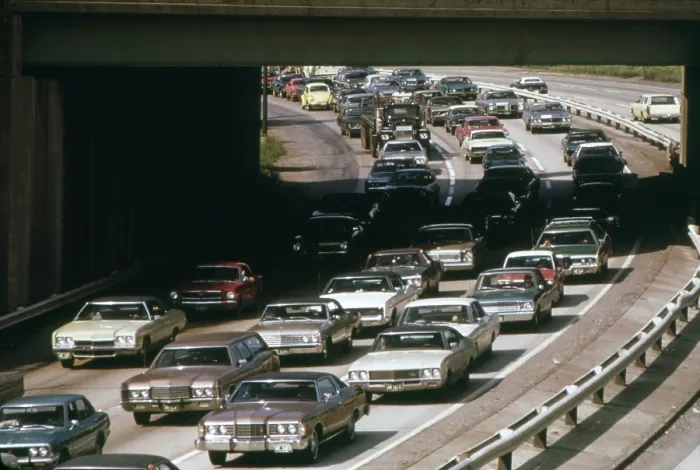 Framed Print : Heavy rush hour traffic as commuters drive to their suburban homes from their workplaces in Cleveland. Ca. 1973-75