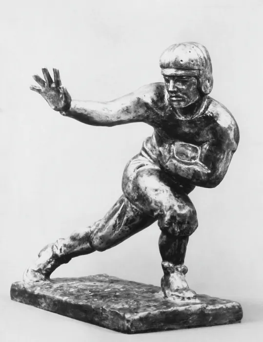 Framed Print : Heisman Memorial Trophy Award, awarded annually to the most outstanding U.S. collegiate football player, circa 1970s, Courtesy: CSU Archives / Everett Collection