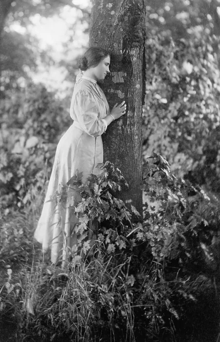 Framed Print : Helen Keller (1880-1968), blind and deaf since age 2, standing by tree, in 1907