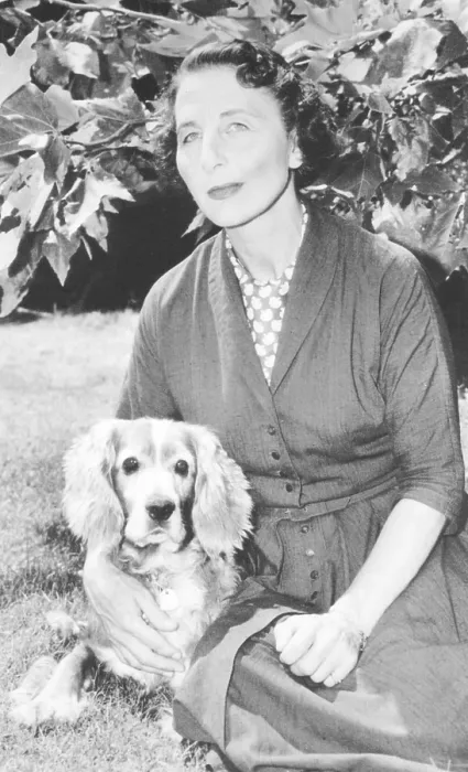 Framed Print : Helen Wills Moody Roark and her dog Docky at her Los Angeles home in August 1958