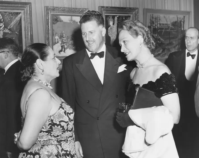 Framed Print : Helena Rubenstein, world famous cosmetician and art collector greets guests at her NYC home. Oct. 1950