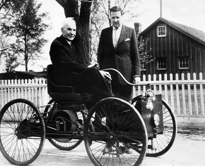Framed Print : Henry Ford sits in his first Ford car built in 1896, as his grandson, Henry Ford II stands nearby. ca. 1946. Courtesy: CSU Archives / Everett Collection