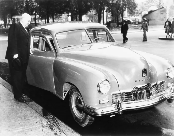 Framed Print : Henry Kaiser opens the door of the first Kaiser Special to come off assembly-line, May 31, 1946. Kaiser Motors produced cars until 1955. (CSU_2015_8_656)