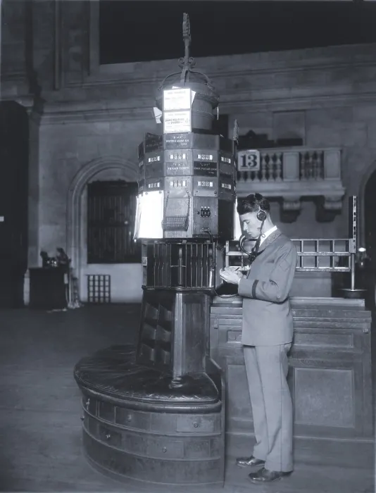 Framed Print : High technology in 1928 was the NY Stock Exchange's new quotation system. Photo shows a telephone operator, with headphones and mouthpiece at his post on the trading floor