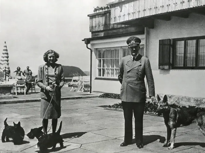 Framed Print : Hitler and Ava Braun with their dogs at Berchtesgaden, ca. 1937-1943. Braun and Hitler remained a couple for 13 years, from 1932-1945. (BSLOC_2015_13_61) Framed Print : Hitler and Ava Braun with their dogs at Berchtesgaden, ca. 1937-1943. Braun and Hitler remained a couple for 13 years, from 1932-1945. (BSLOC_2015_13_61)