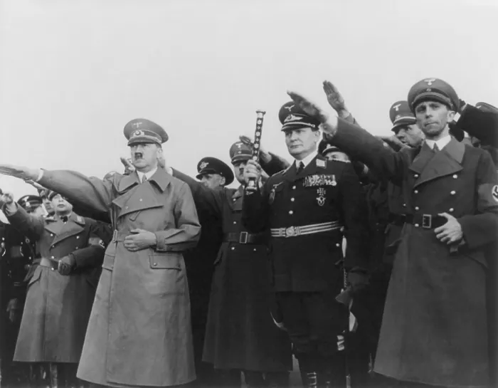 Framed Print : Hitler, with Goering and Goebbels, saluting upon his return from Austria. On the previous day Hitler signed the unification pact annexing Austria into Germany Framed Print : Hitler, with Goering and Goebbels, saluting upon his return from Austria. On the previous day Hitler signed the unification pact annexing Austria into Germany
