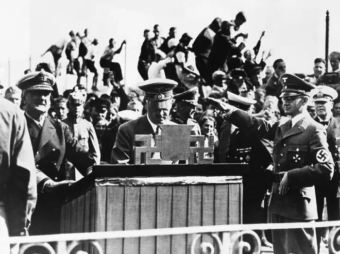 Framed Print : Hitler and Hungarian Regent Horthy at Heligoland Island in the North Sea, Sept. 1, 1938. Adolf Hitler signed the Golden Book of this island, as a Nazi official a saluted