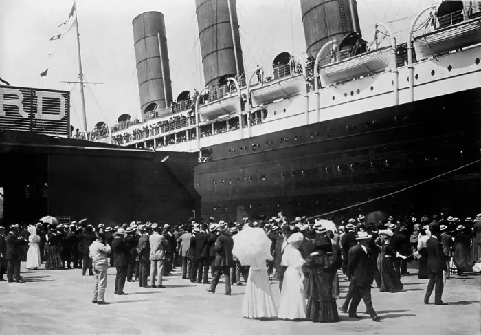 Framed Print : HMS Lusitania at New York dock in 1907. She is met by a crowd on her a starboard side. (BSLOC_2012_4_101)