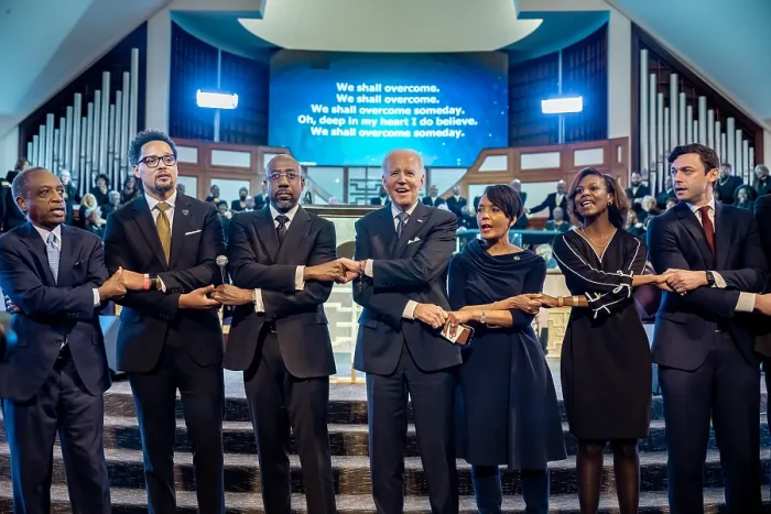 Framed Print : Holding hands and swaying with others, President Biden joins as the Ebenezer Baptist Church choir sings the Civil Rights Movement anthem, We Shall Overcome Framed Print : Holding hands and swaying with others, President Biden joins as the Ebenezer Baptist Church choir sings the Civil Rights Movement anthem, We Shall Overcome