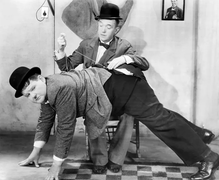 Framed Print : HOLLYWOOD PARTY, from left: Oliver Hardy, Stan Laurel, 1934