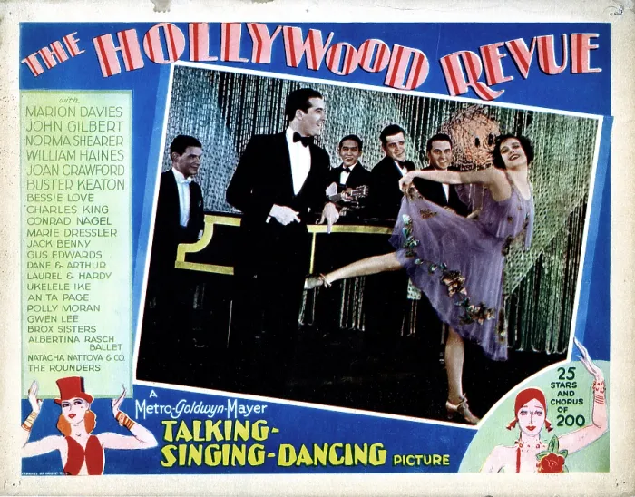 Framed Print : THE HOLLYWOOD REVUE OF 1929, Joan Crawford, being serenaded by pianist Dave Snell, and The Biltmore Quartet (Eddie Bush, Paul Gibbons, Ches Kirkpatrick, Bill Seckler), 1929