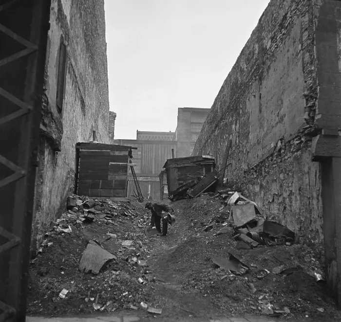 Framed Print : A homeless African American man searches through garbage in a squatter neighborhood along the riverfront in St. Louis, Missouri. 1935 photo by Arthur Rothstein